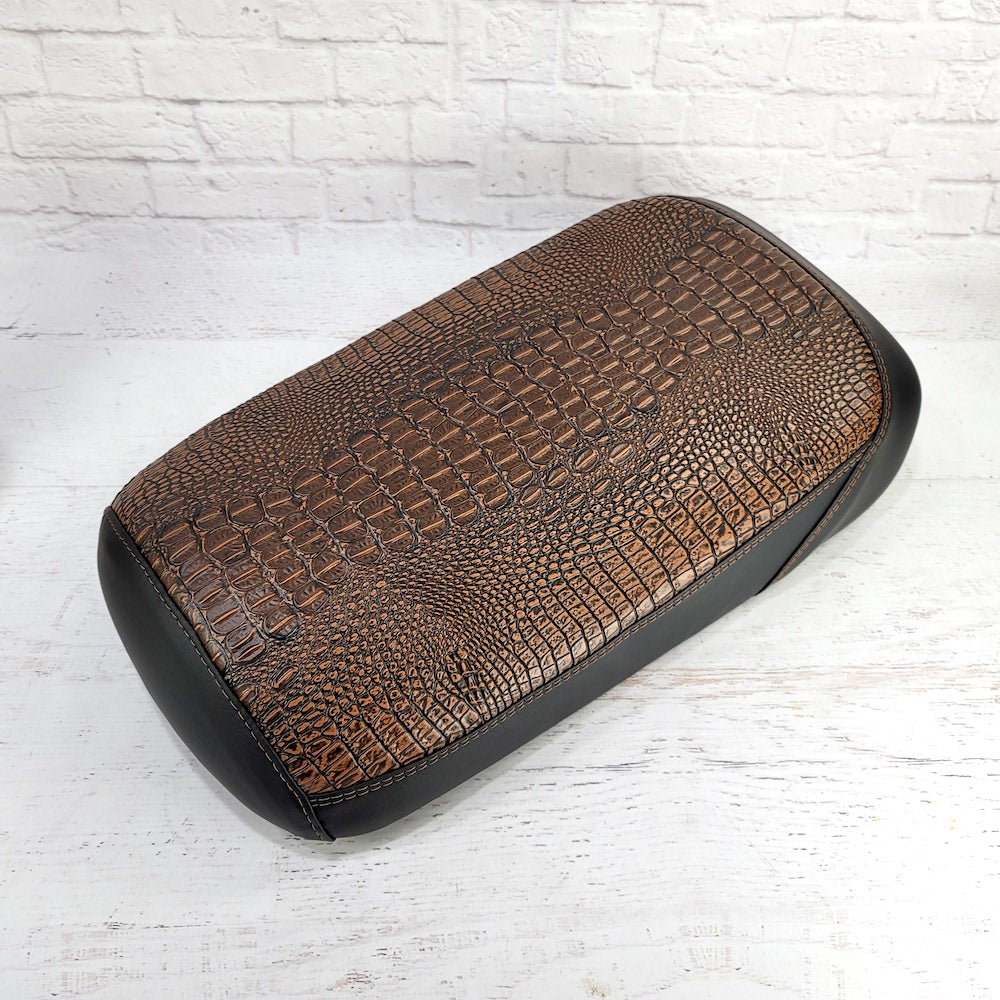 Brown crocodile-textured Maddog seat cover with padded cafe-racer styling and black side panels, handmade by Cheeky Seats