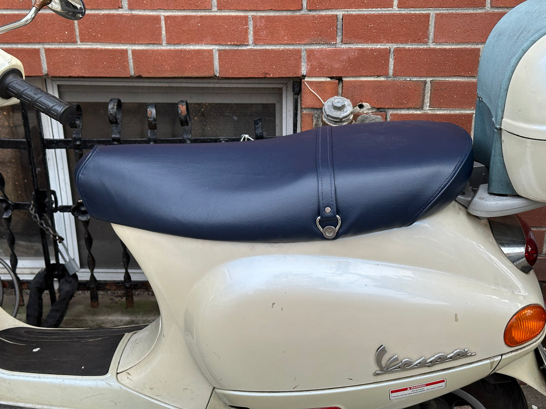 Vespa ET 2/4 navy blue seat cover installed on scooter by Cheeky Seats