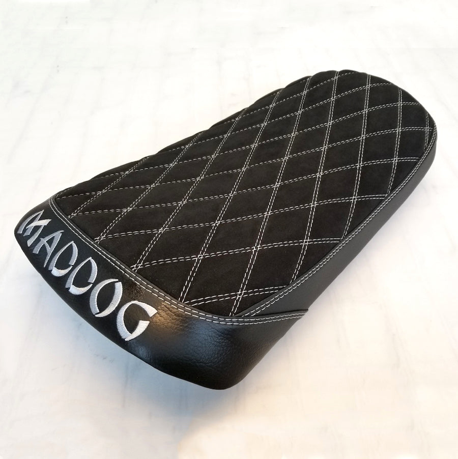 Black Alcantara suede diamond-stitched Maddog seat cover with white contrast stitching and white MADDOG embroidery, handmade by Cheeky Seats